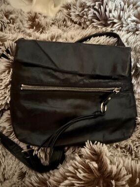 HOBO Black Leather Crossbody with Tassel Zip Pocket